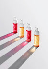 Bare by Vogue Clear Tanning Water, Dark
