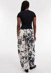 TOPSHOP Cicely Faux Leather Cow Print Trousers, Black