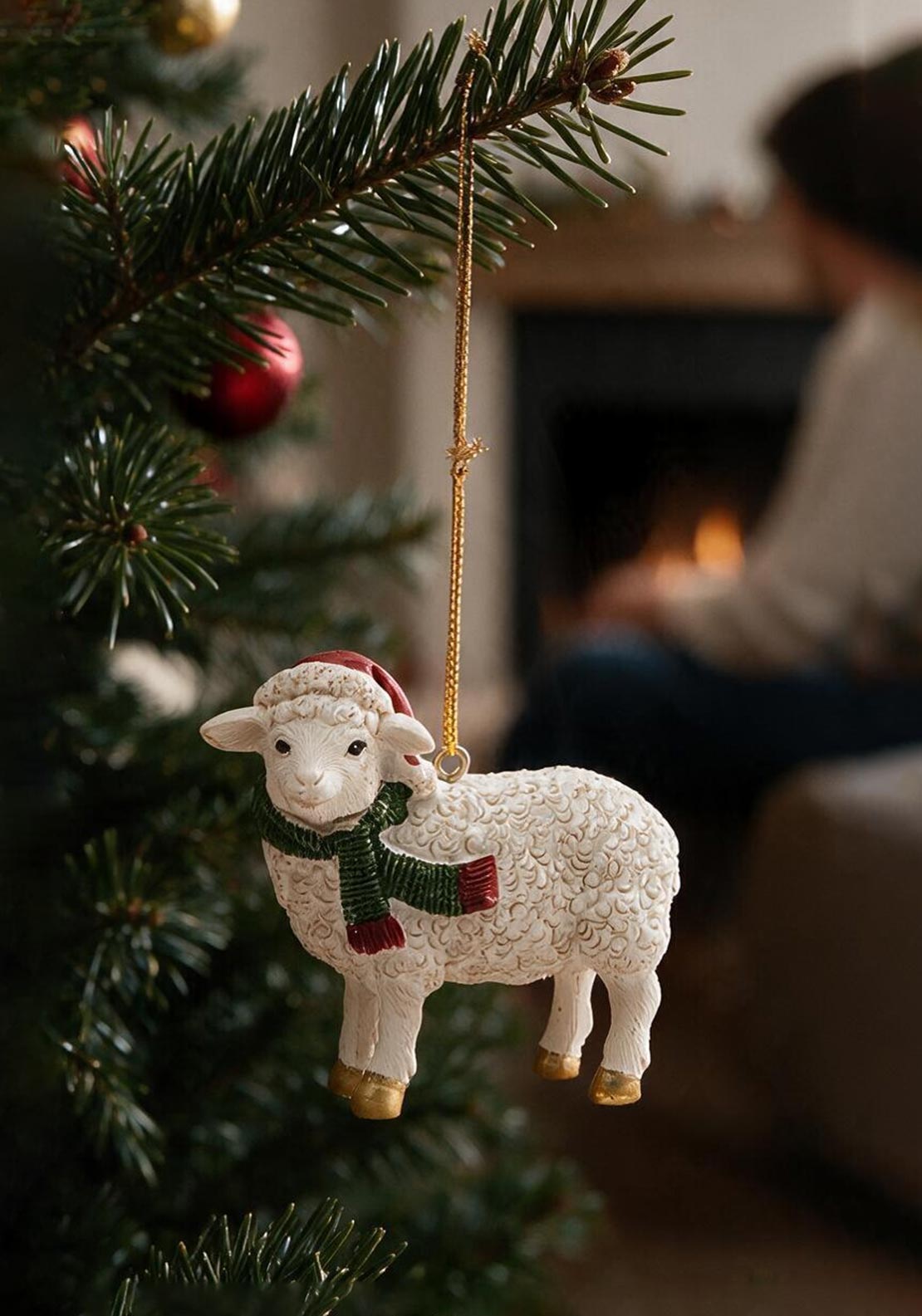 SHEEP WITH TREE TRIM WITH SANTA HAT AND