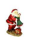 Verano Santa Lifting Child on Gift Ornament