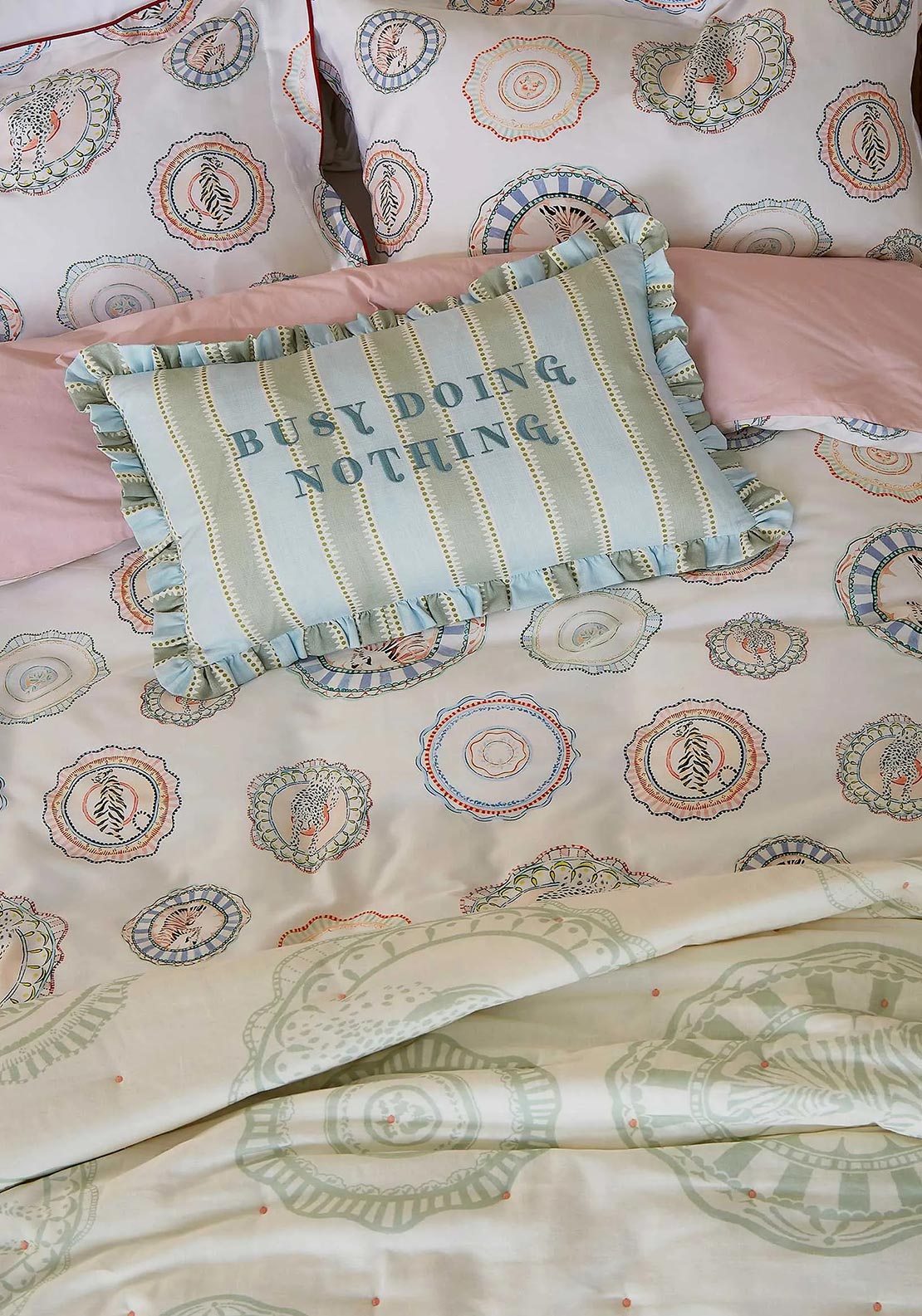 Bedeck Yvonne Ellen Busy Doing Nothing Cushion 60x40cm, Multi